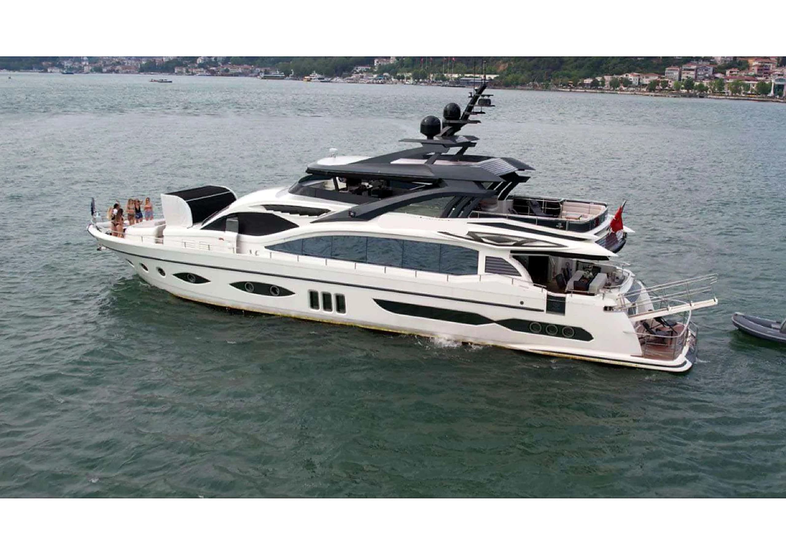 35m Ultraluxury Motor Yacht side profile cruising at sunset in Bodrum