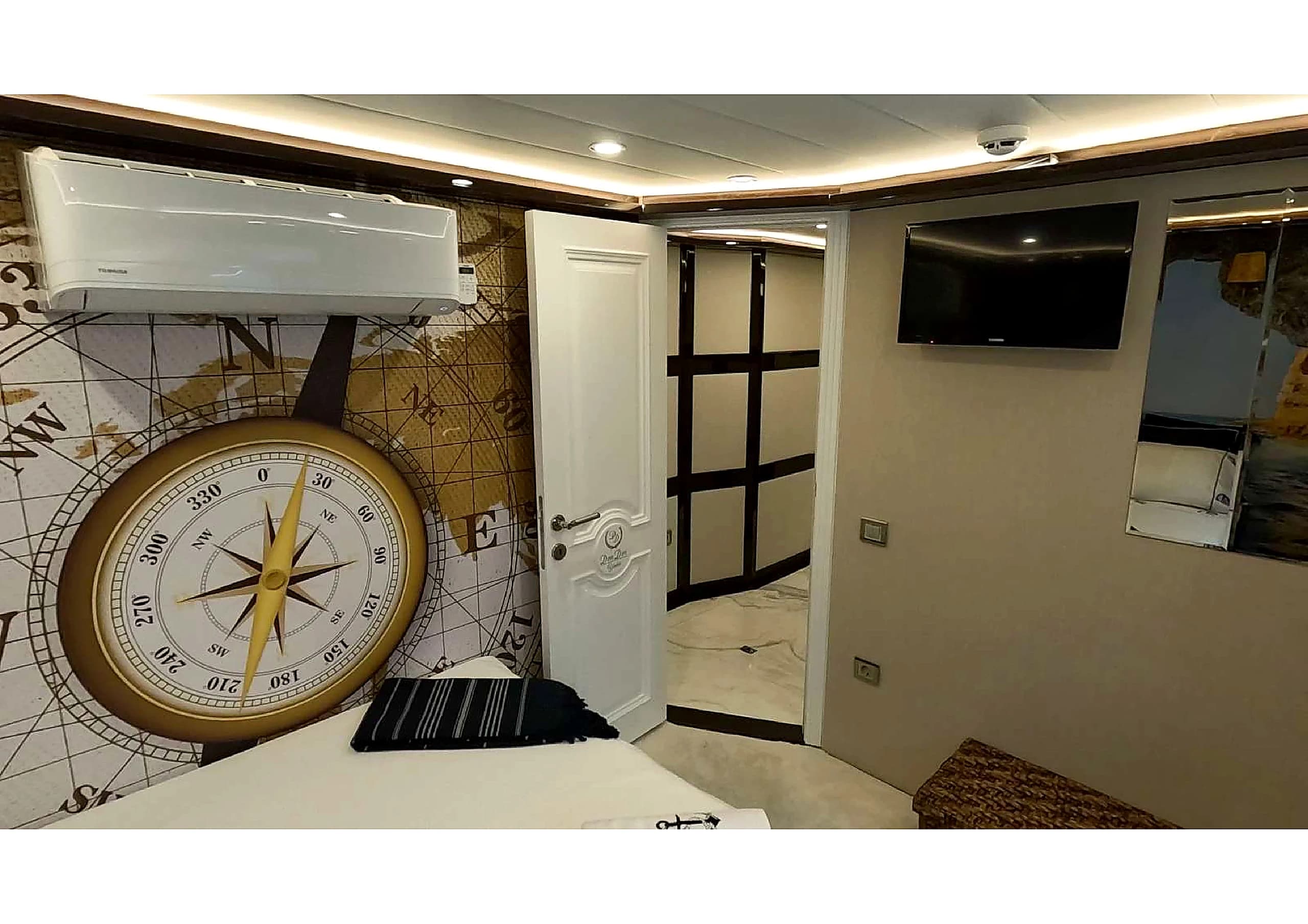 Luxury ensuite bathroom with designer vanity and mirror on 35m Yacht
