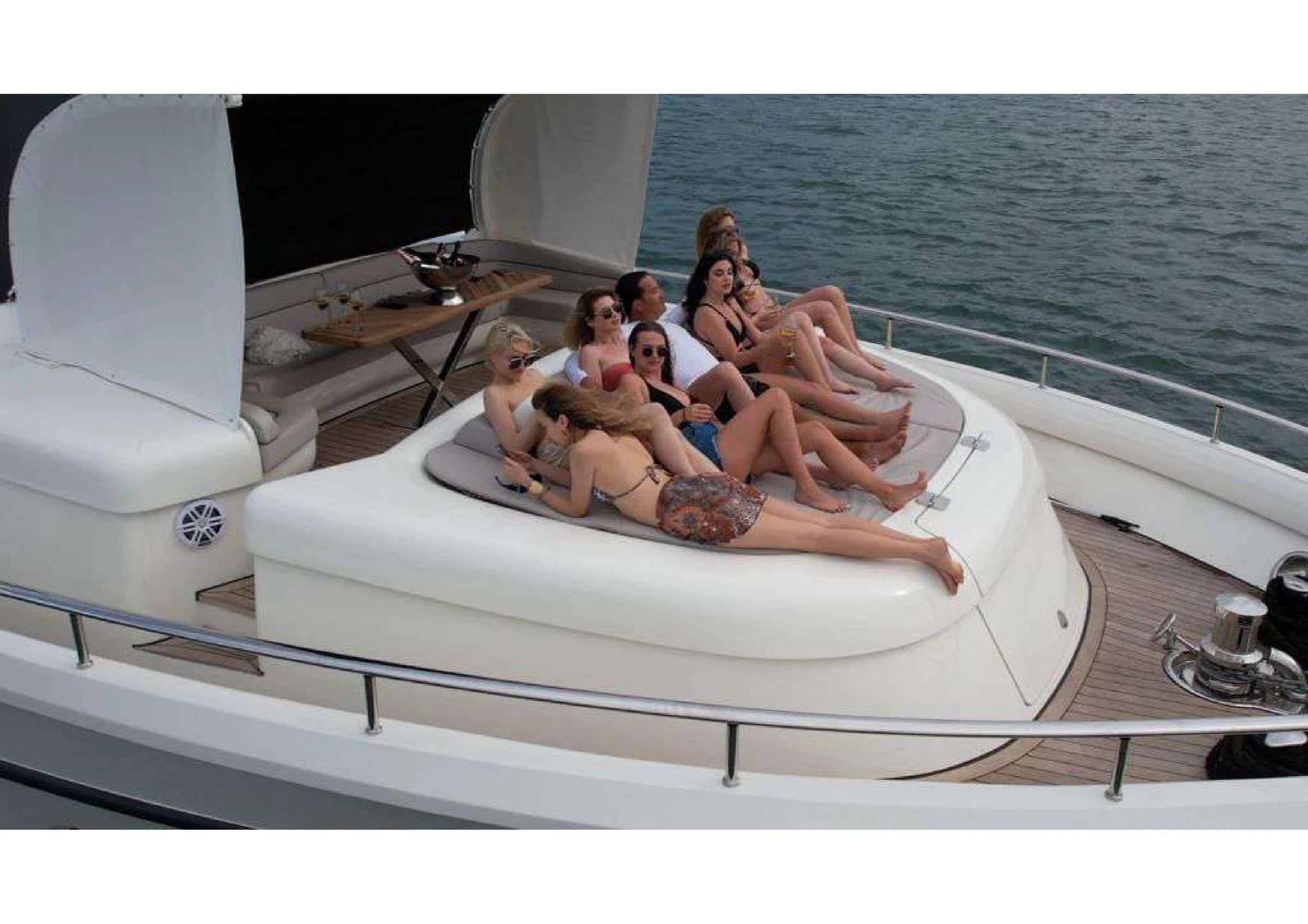 Spacious flybridge deck with luxury sunbeds on 35m Ultraluxury Yacht