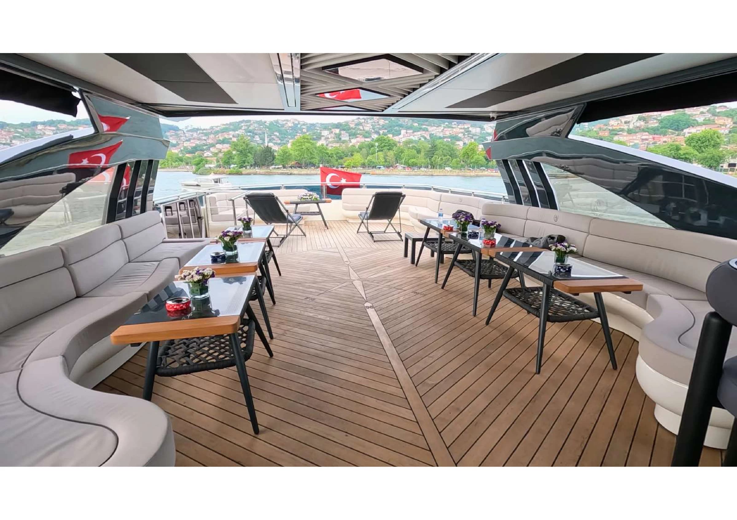 Foredeck lounge area with comfortable sunbeds on 35m Yacht