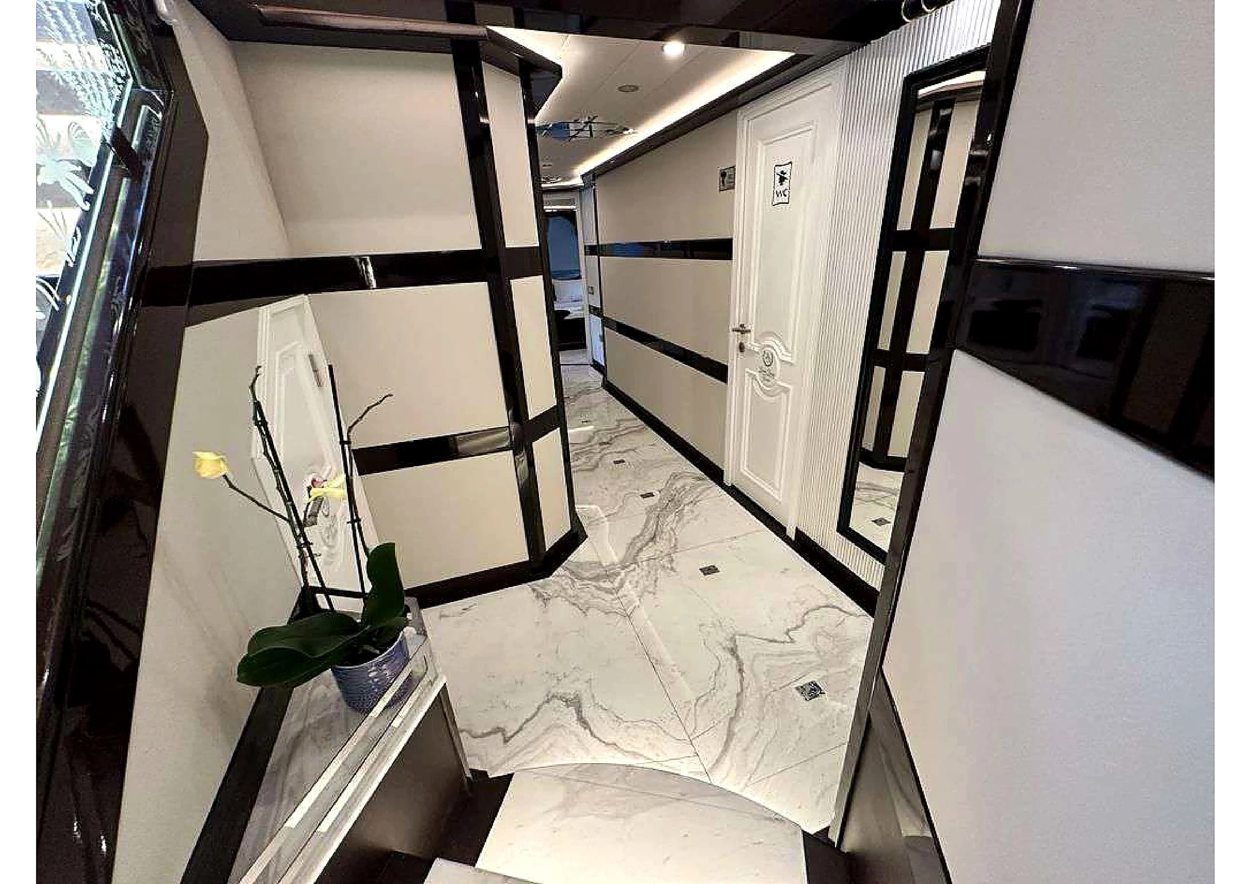 Guest suite bathroom with glass shower stall on 35m Yacht