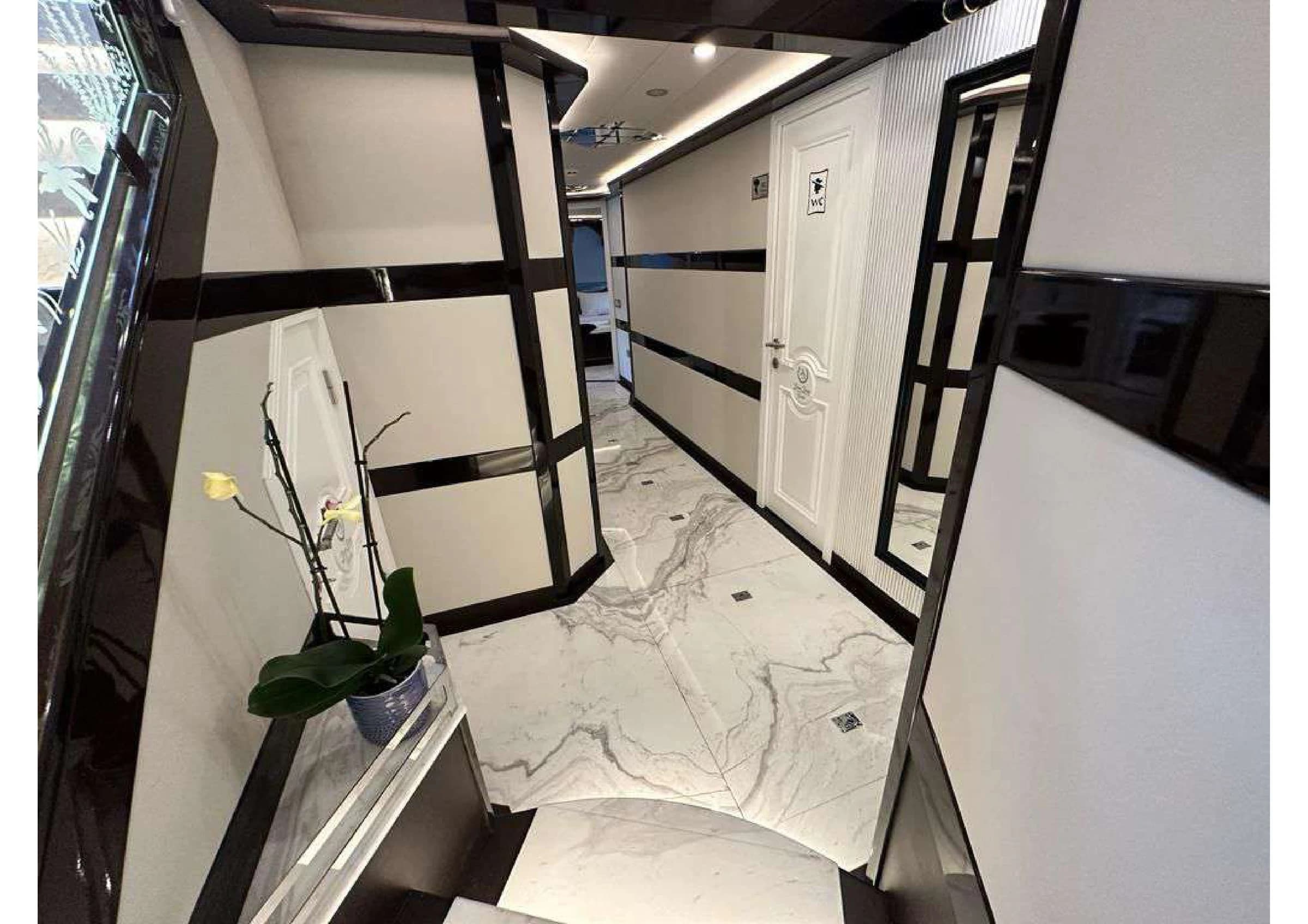 Guest suite bathroom with glass shower stall on 35m Yacht