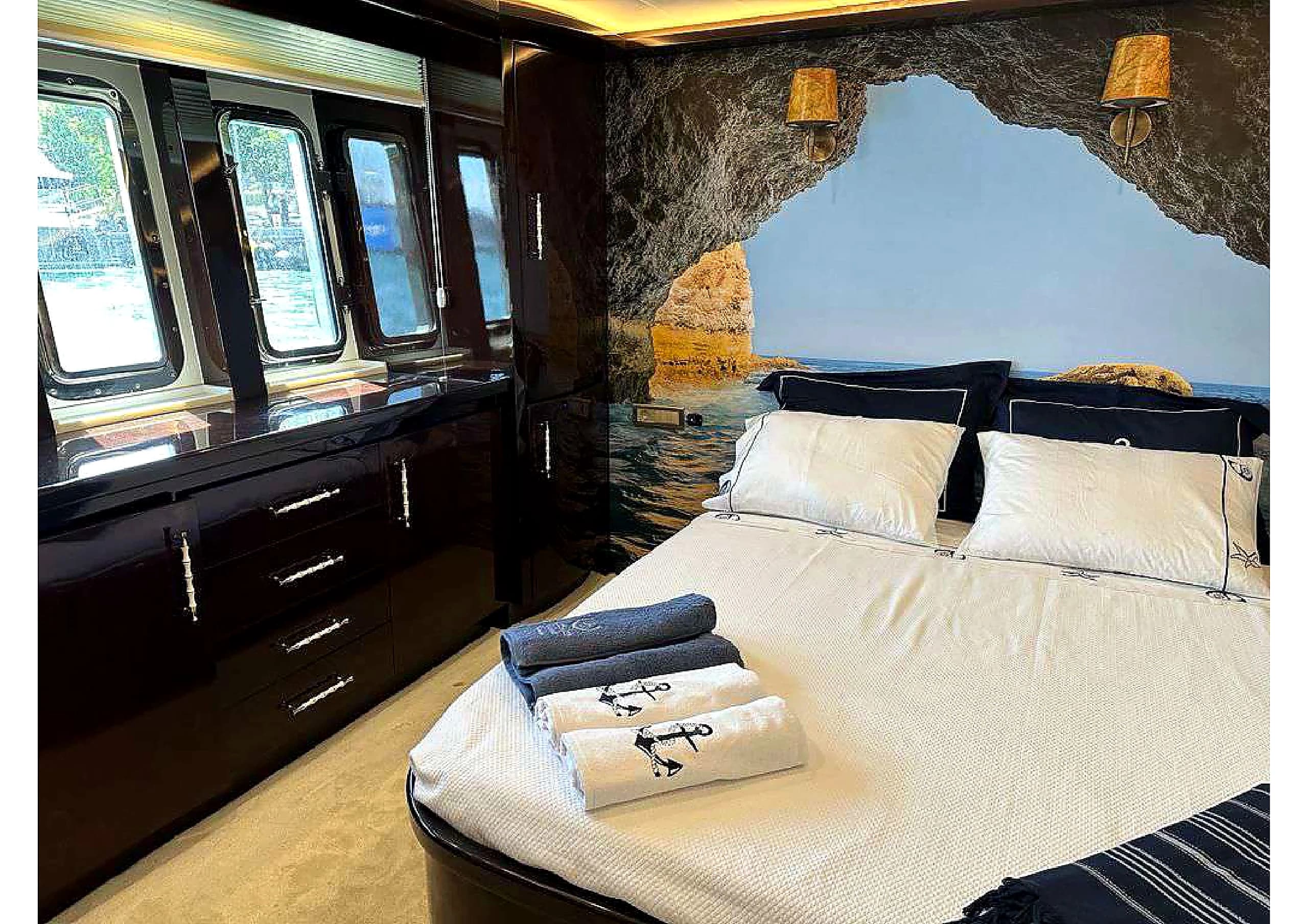 Master stateroom interior cabin with king bed on 35m Yacht