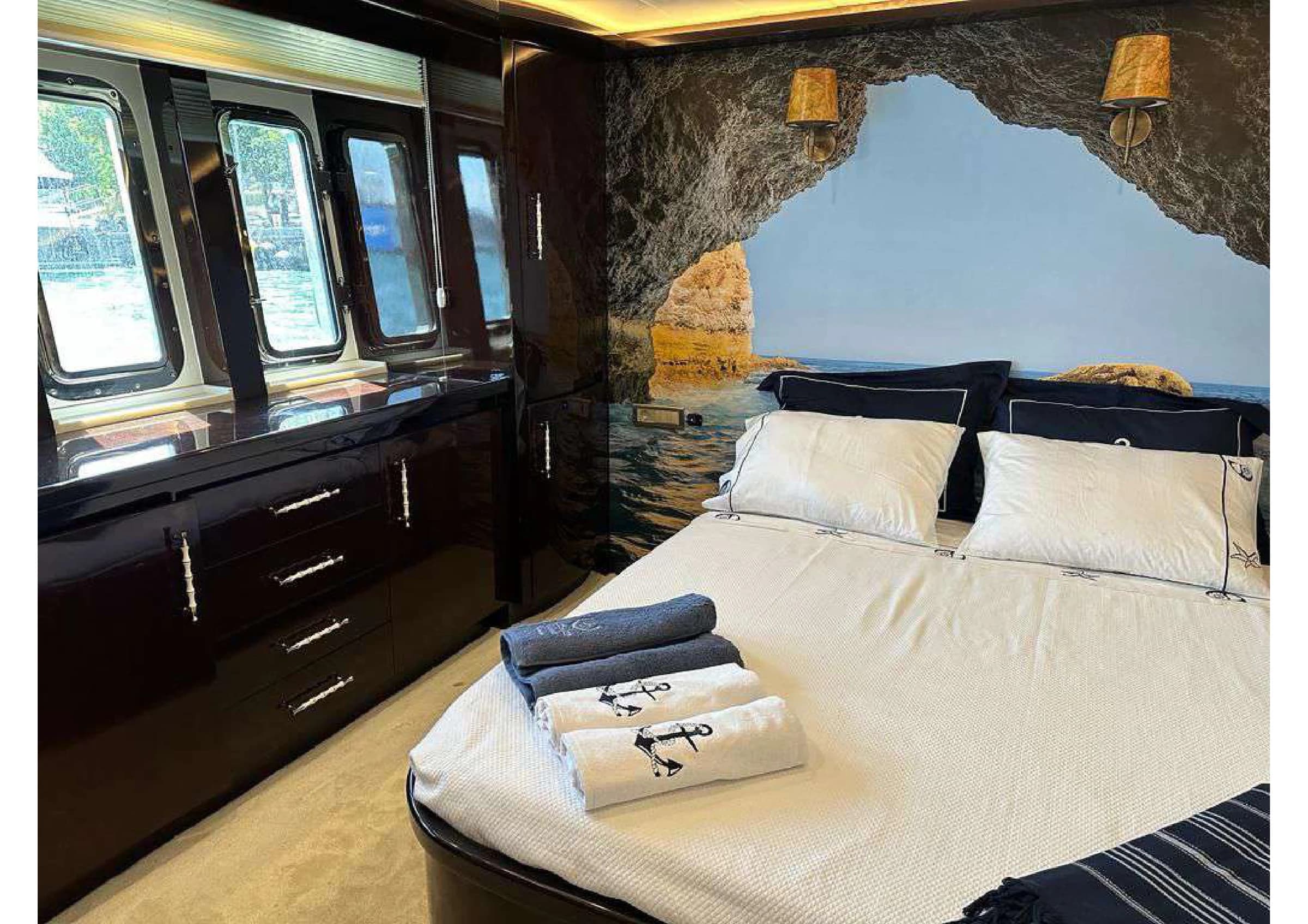 Master stateroom interior cabin with king bed on 35m Yacht