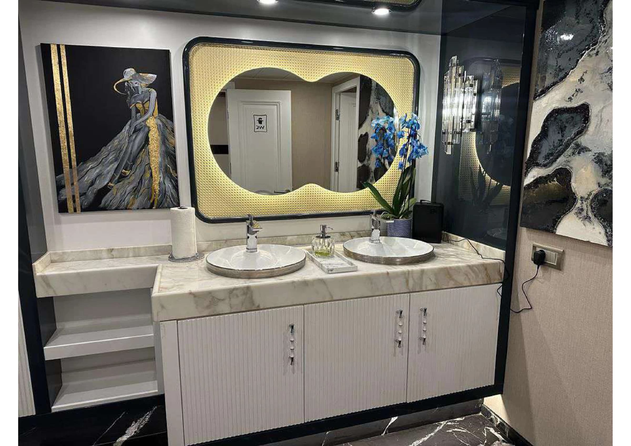 Modern guest bathroom with premium chrome fittings on 35m Yacht