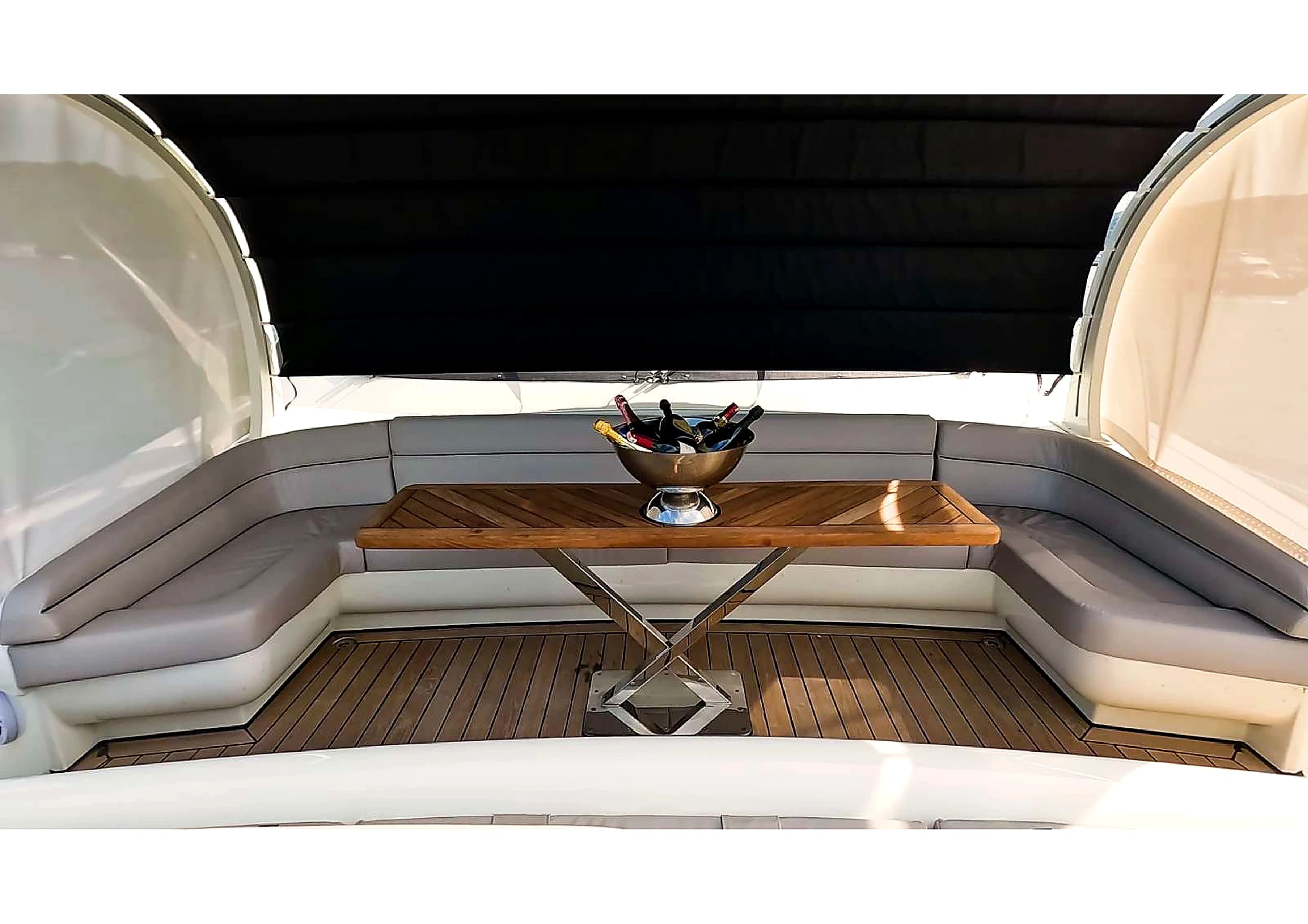 Relaxing daybeds on the upper deck of 35m Ultraluxury Yacht