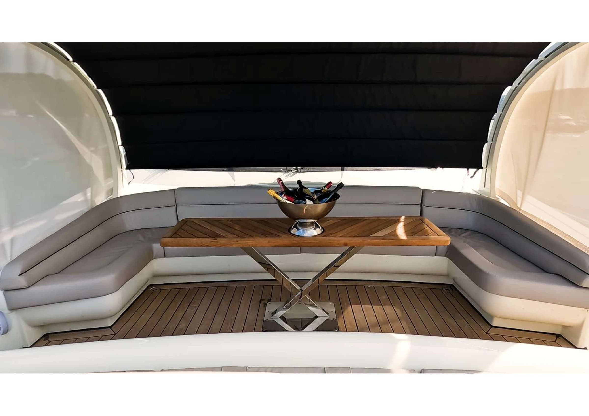 Relaxing daybeds on the upper deck of 35m Ultraluxury Yacht