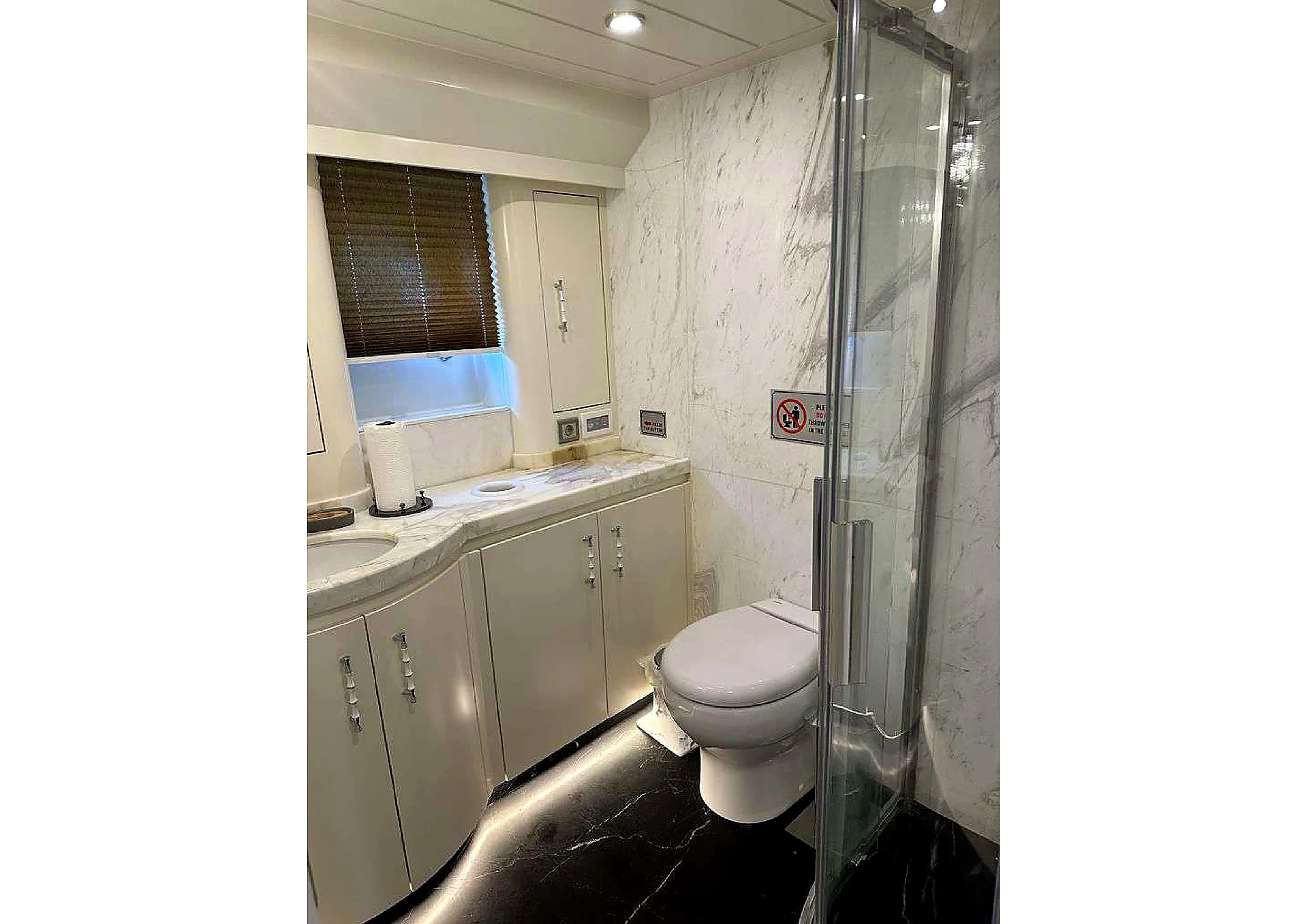 Spacious walk-in shower room in stateroom bathroom on 35m Yacht