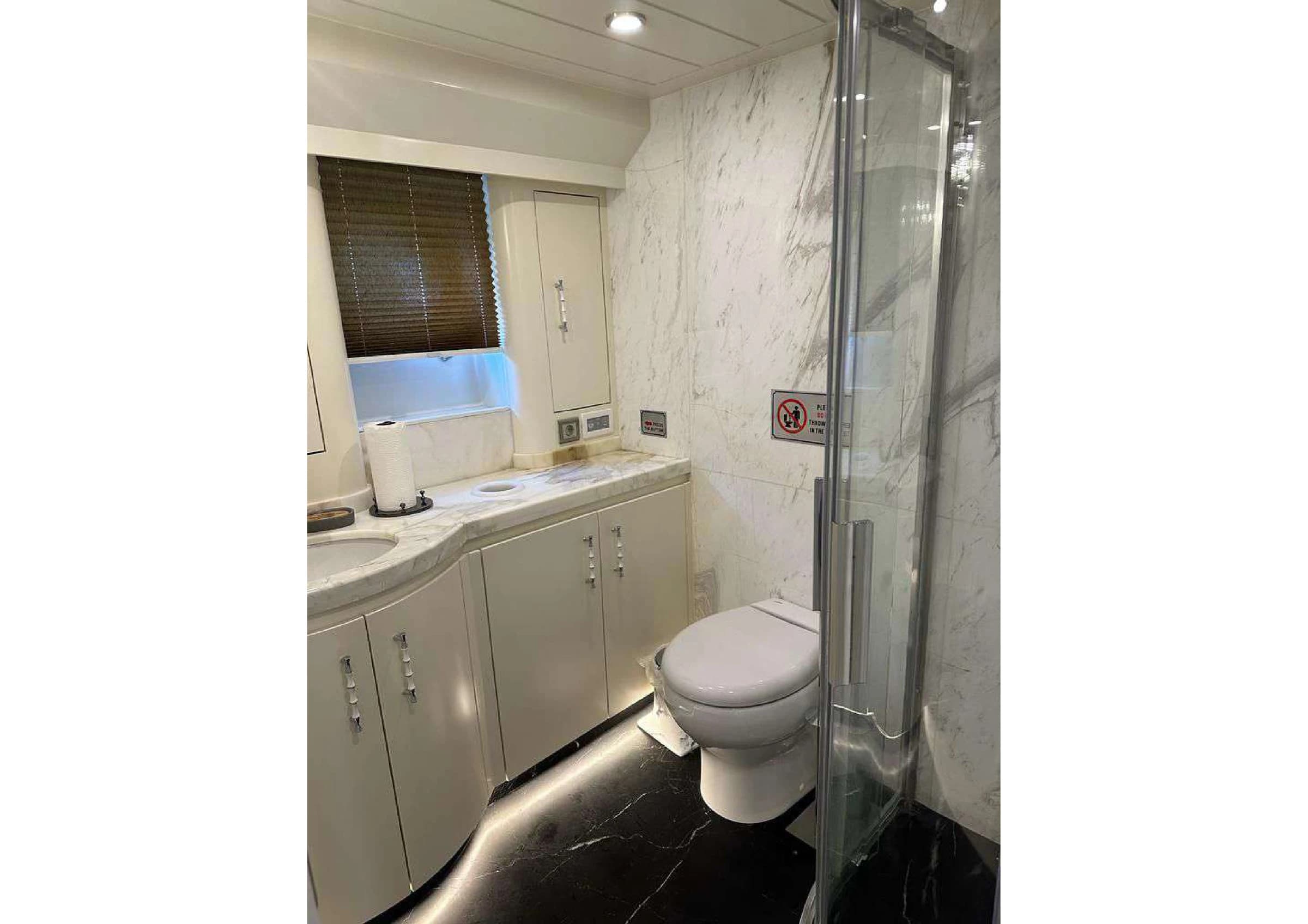 Spacious walk-in shower room in stateroom bathroom on 35m Yacht