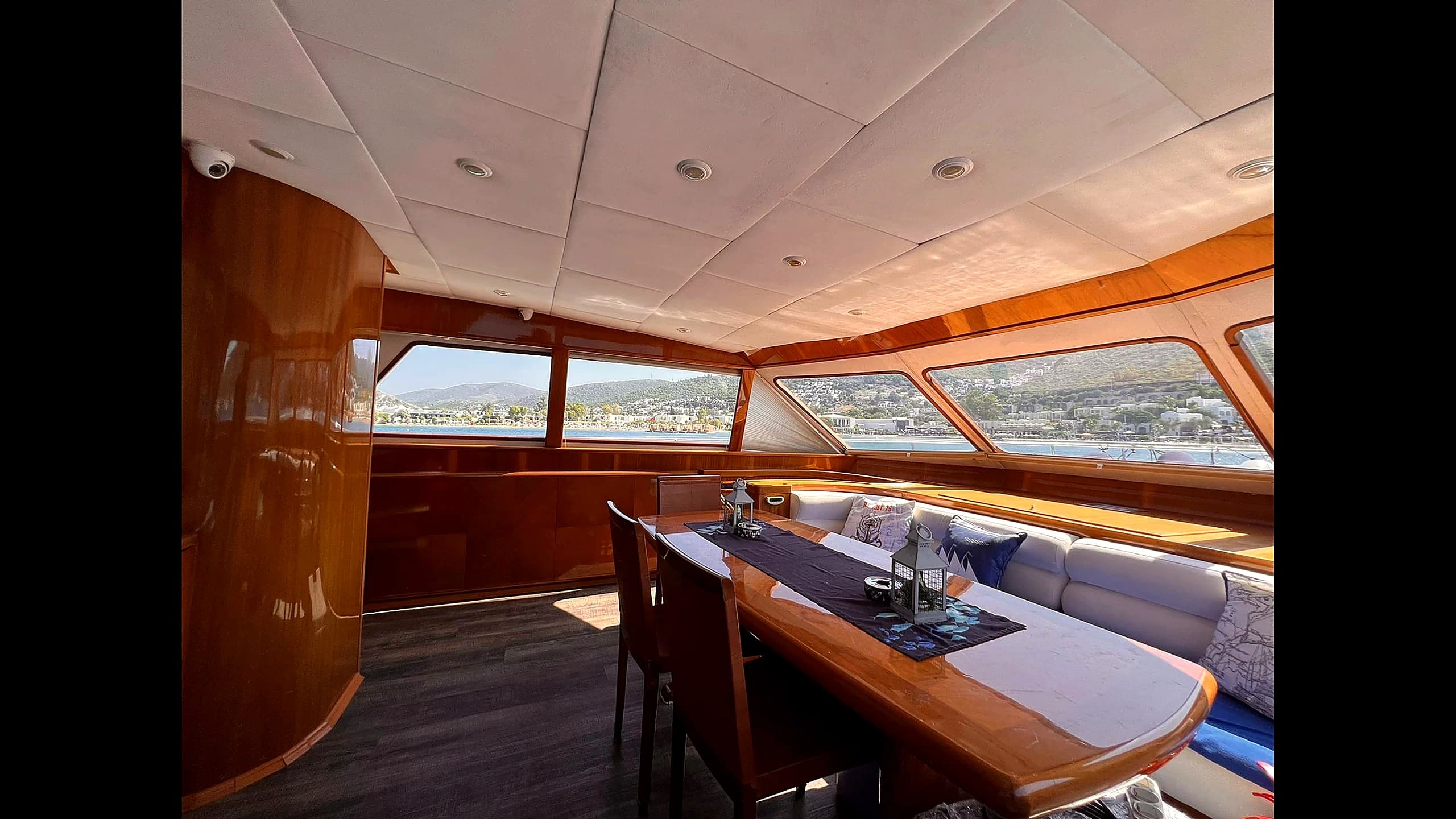 Formal indoor dining table in the main salon of 27m Yacht