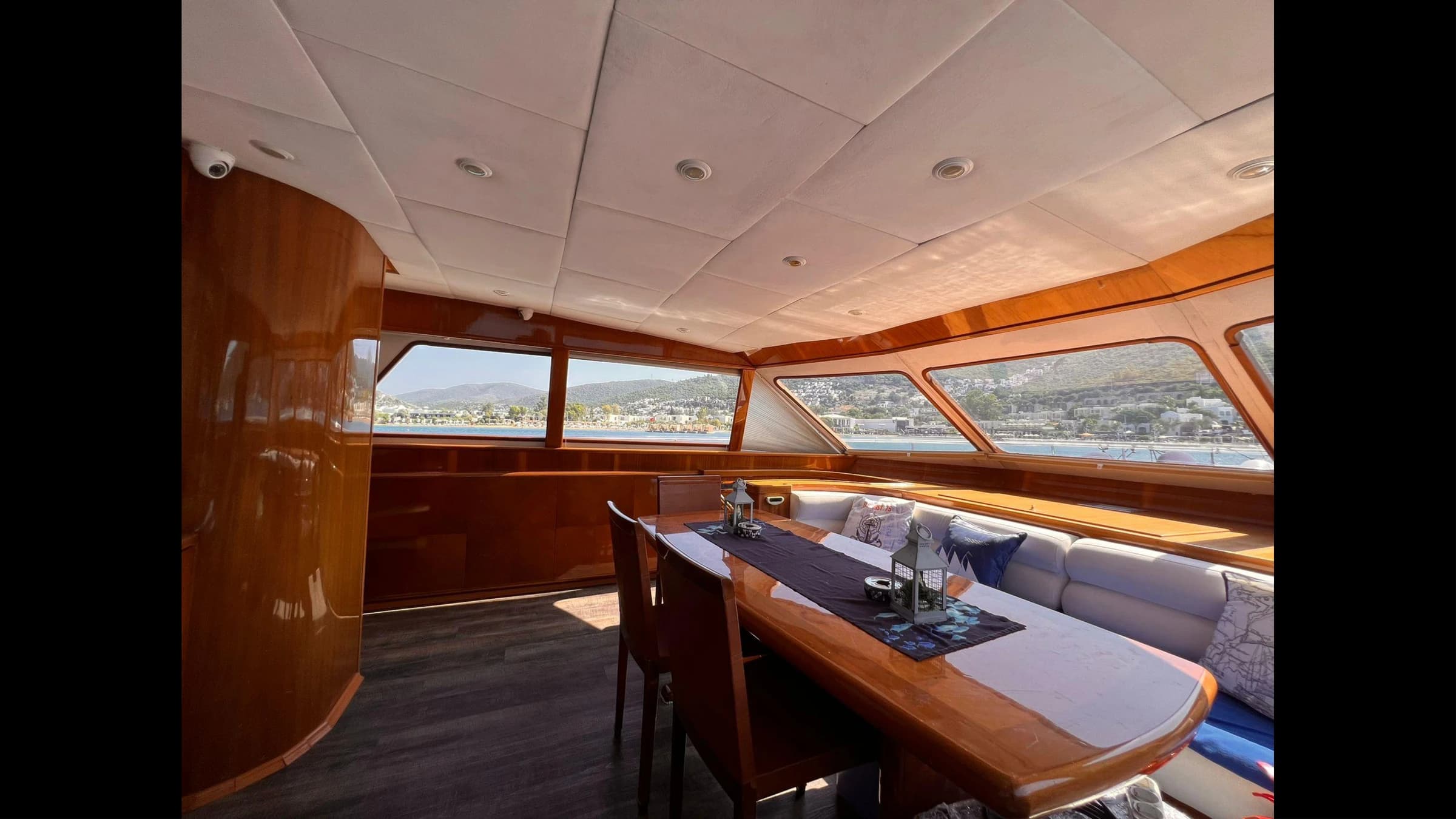 Formal indoor dining table in the main salon of 27m Yacht