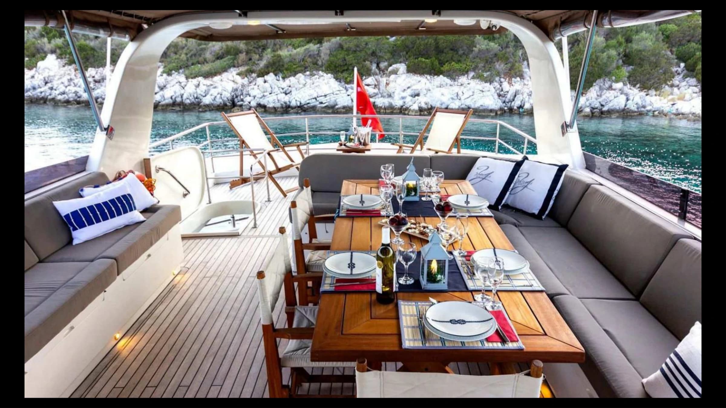 Spacious sunbathing deck area with sun loungers