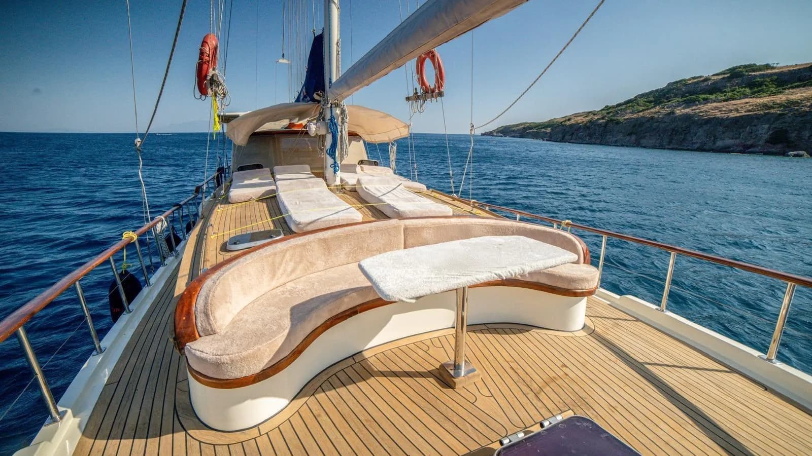 Shaded deck lounge on the Muka sailing yacht