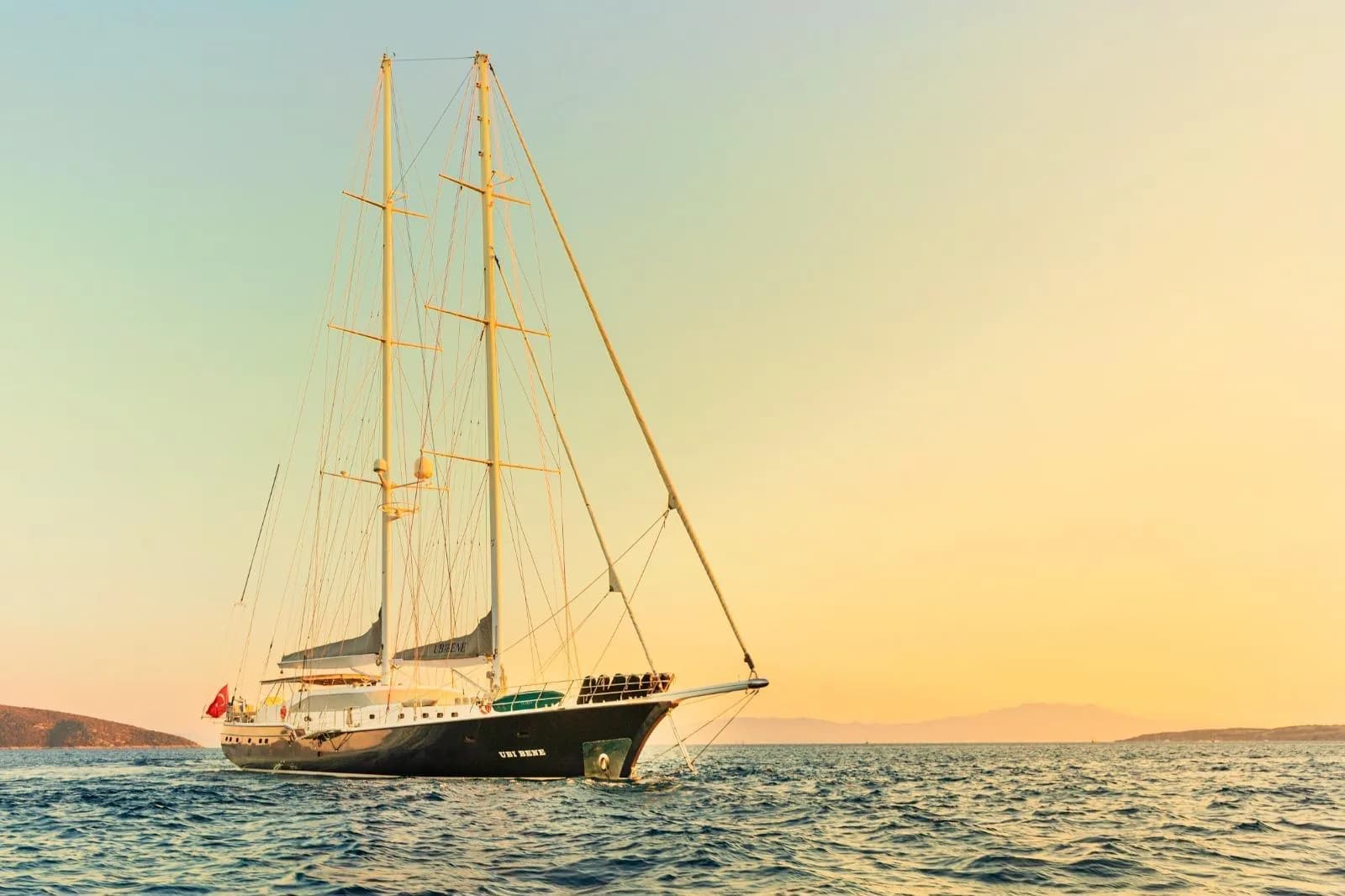 Muka sailing yacht under way at sunset off Bodrum