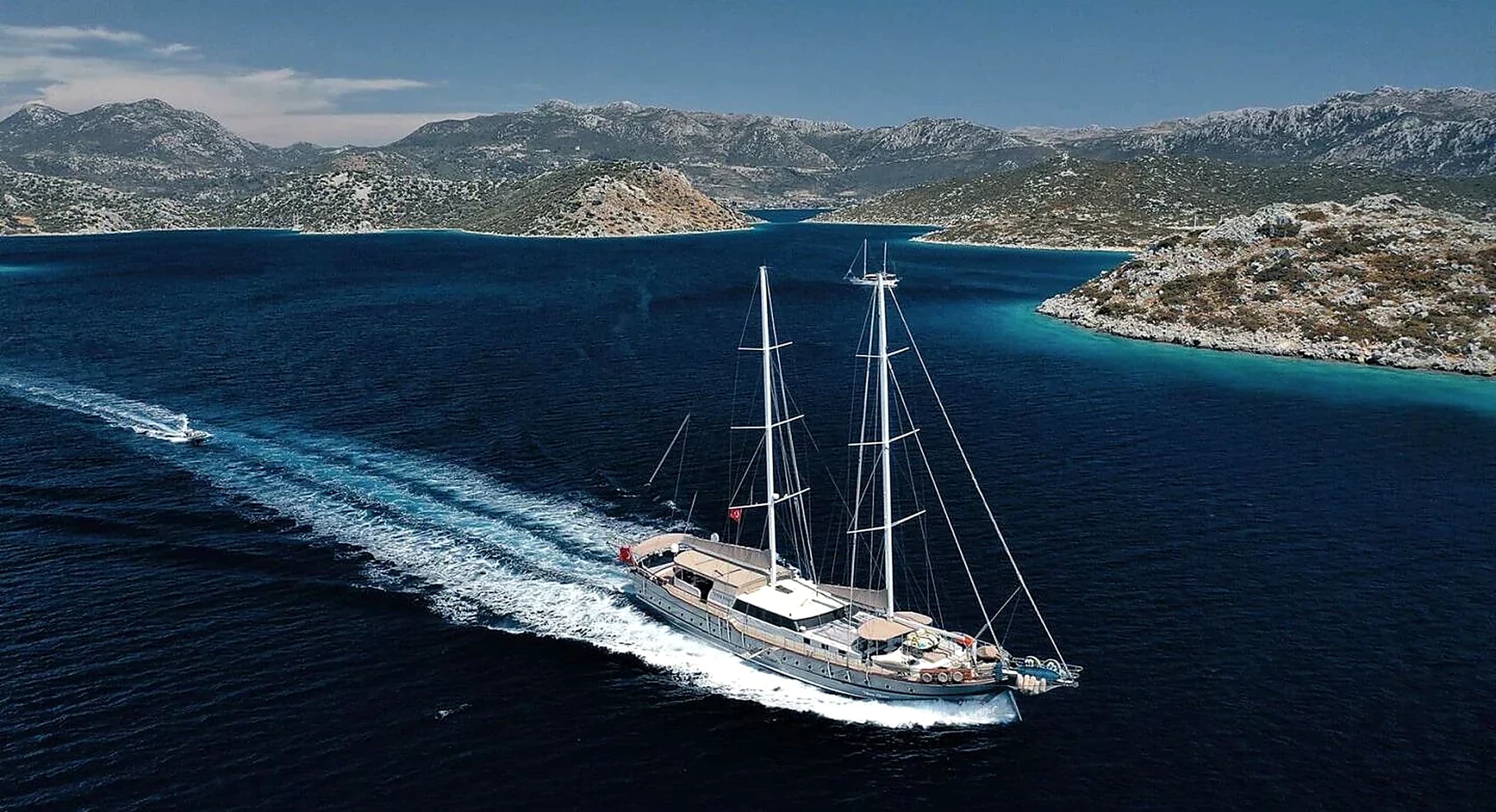 Nevra Queen 40m Luxury Gulet Charter Yacht Profile at Anchor in Bodrum Turquoise Bay in Bodrum