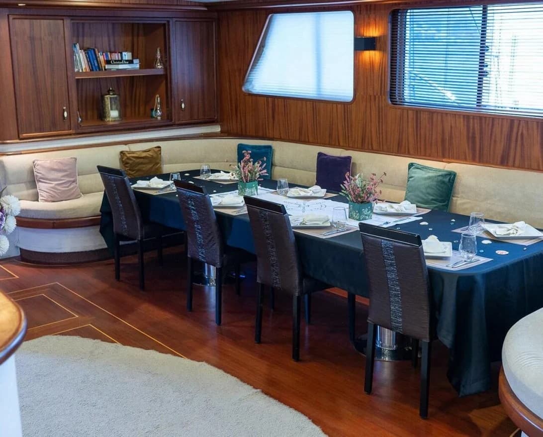 Air-Conditioned Grand Main Salon with Dining and Lounge on Nevra Queen