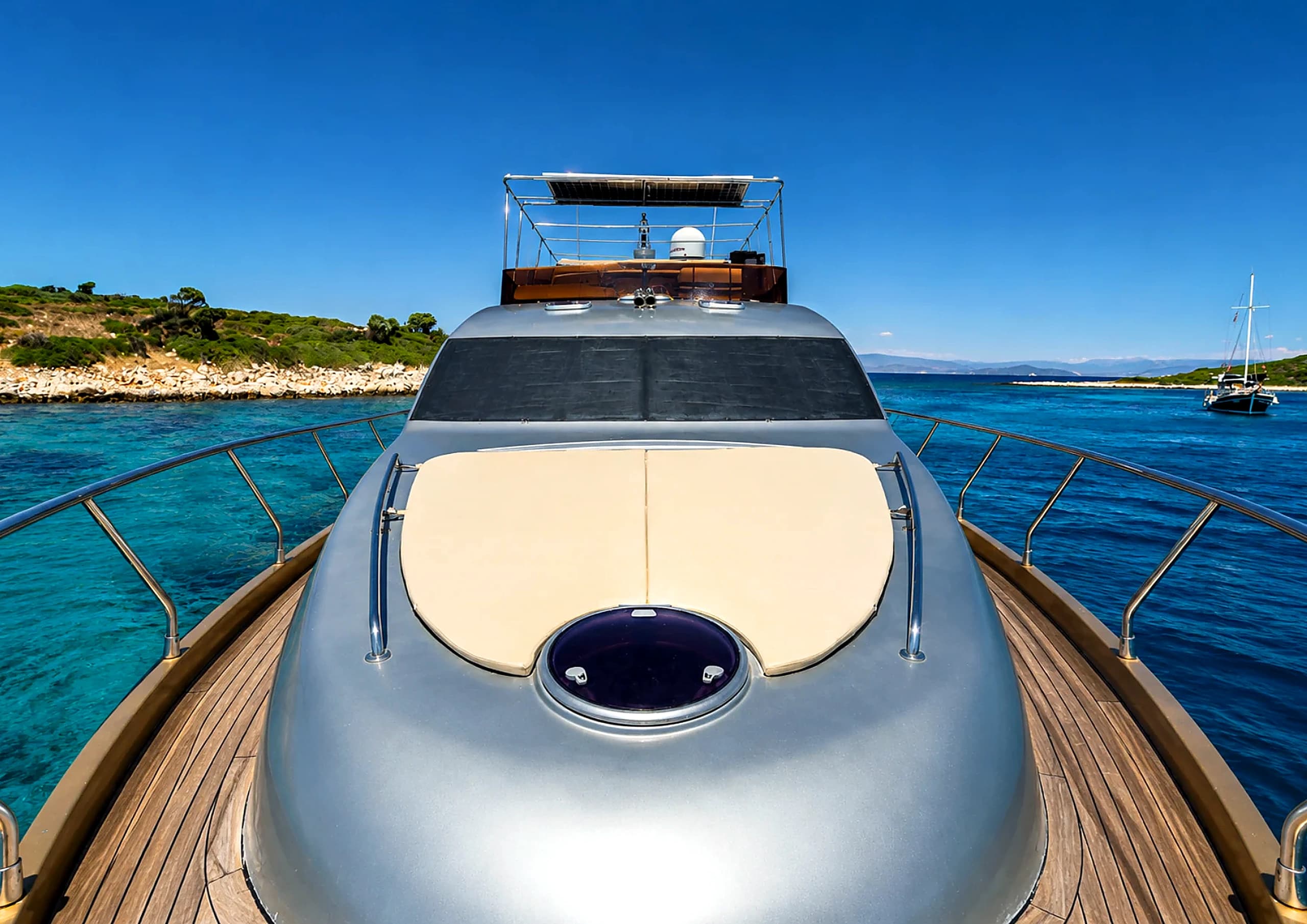Aft deck lounge seating and dining table on Selenge Motor Yacht