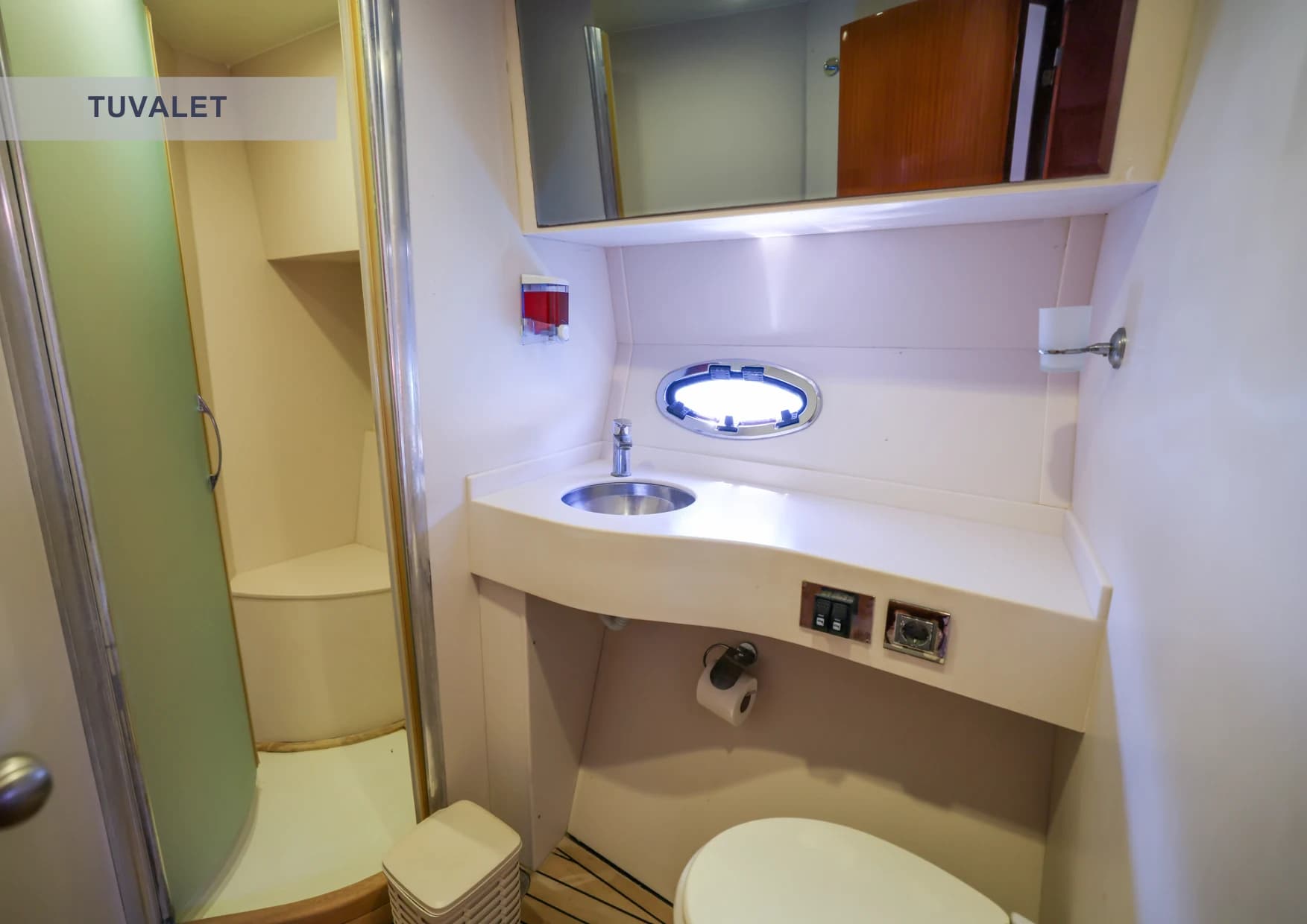 Modern ensuite bathroom with private shower stall on Selenge Yacht
