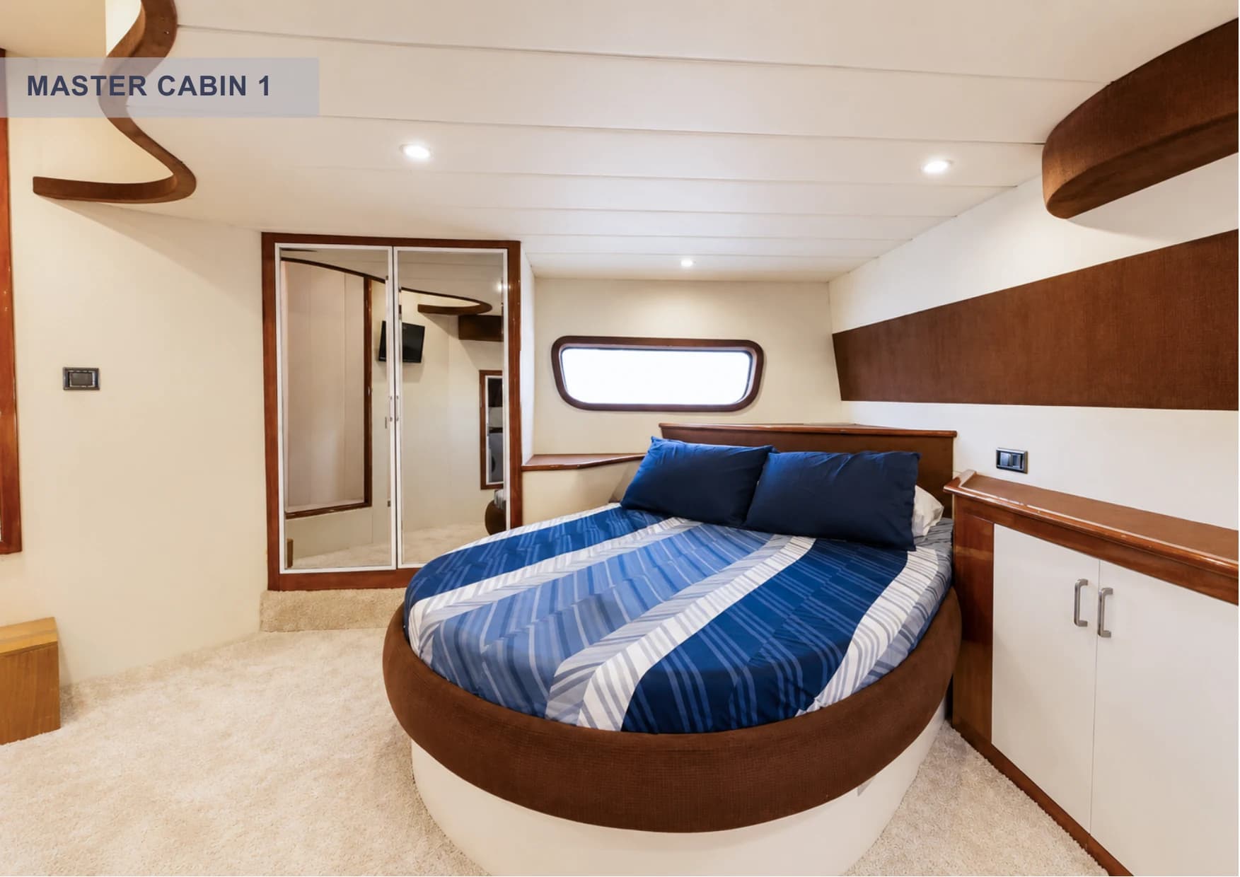 Master Cabin 1 spacious interior with TV, Bluetooth audio and vanity