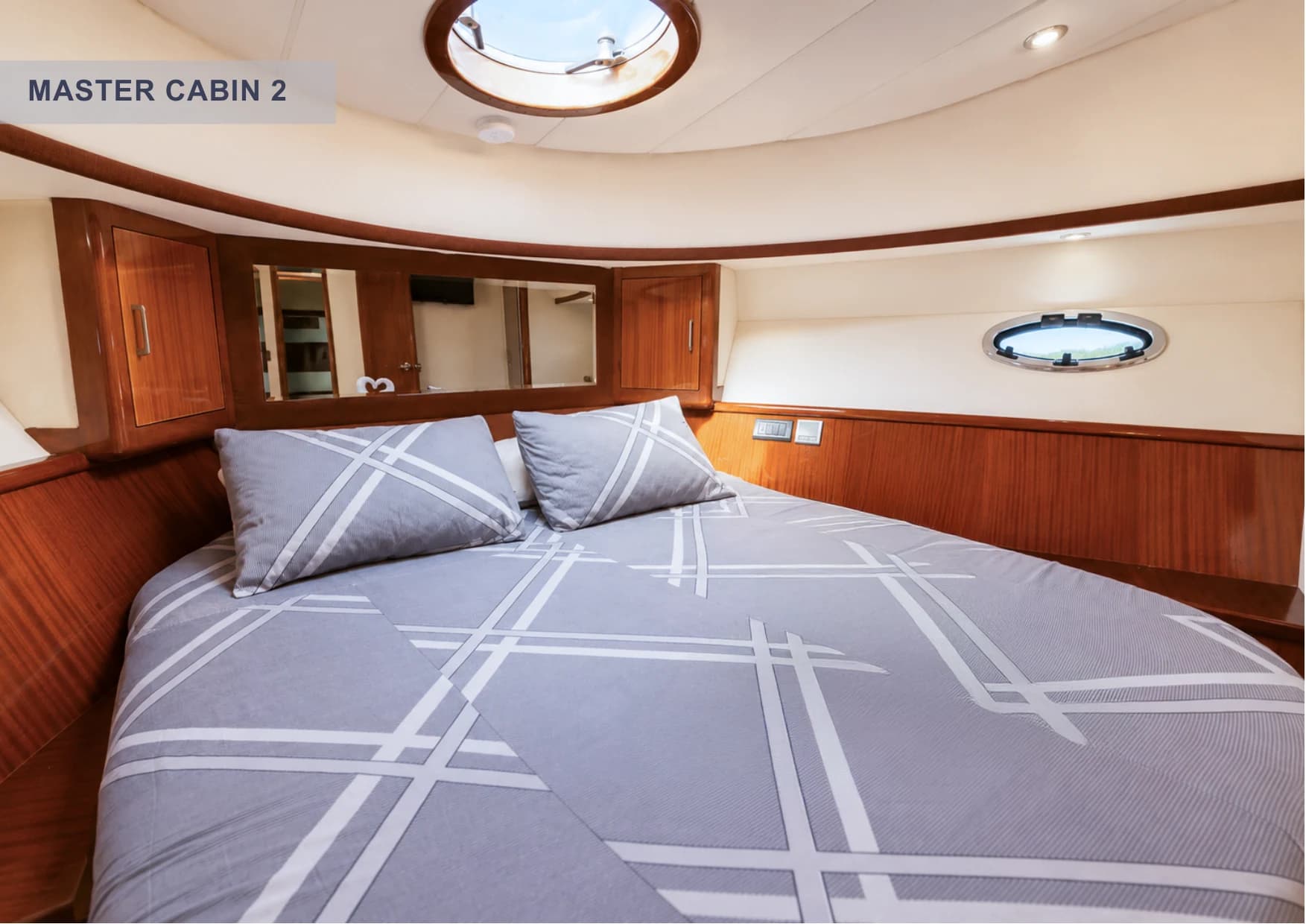 Master Cabin 2 interior view with storage and entertainment