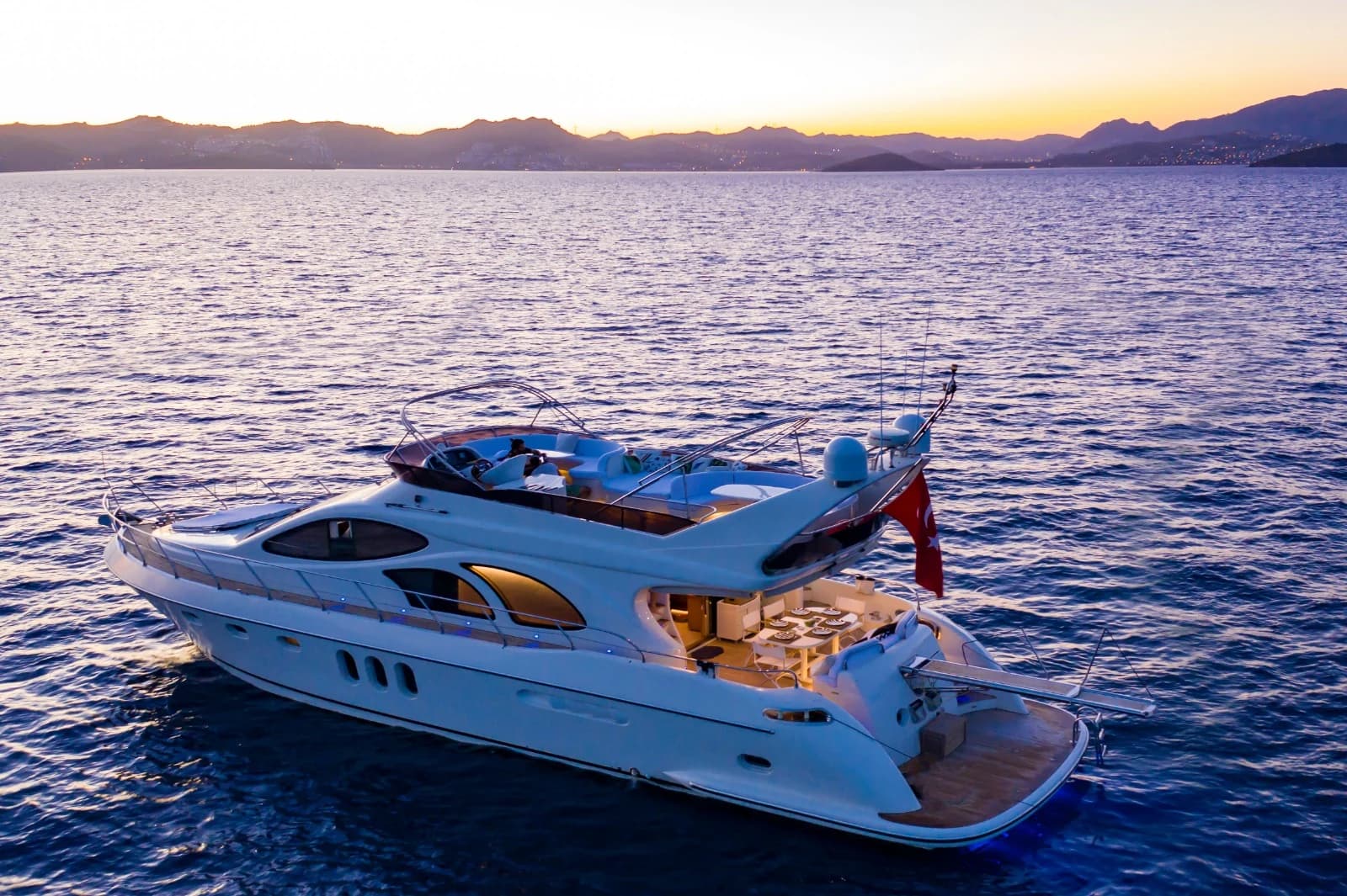 ZL Luxury Flybridge Motor Yacht Sunset Cruising in Bodrum Turquoise Waters