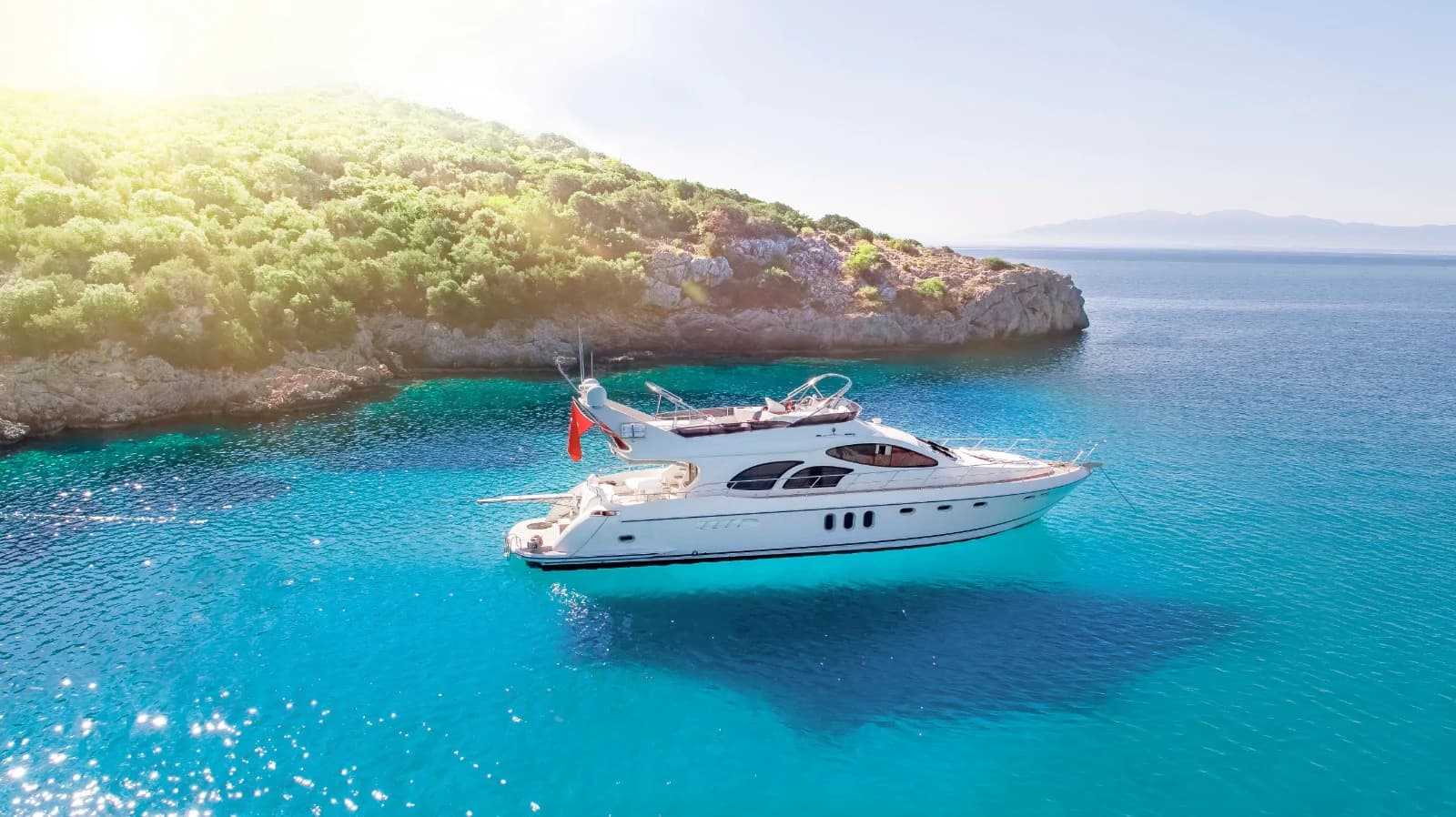 ZL 24m Luxury Motor Yacht Anchored in Crystal Clear Turquoise Bay