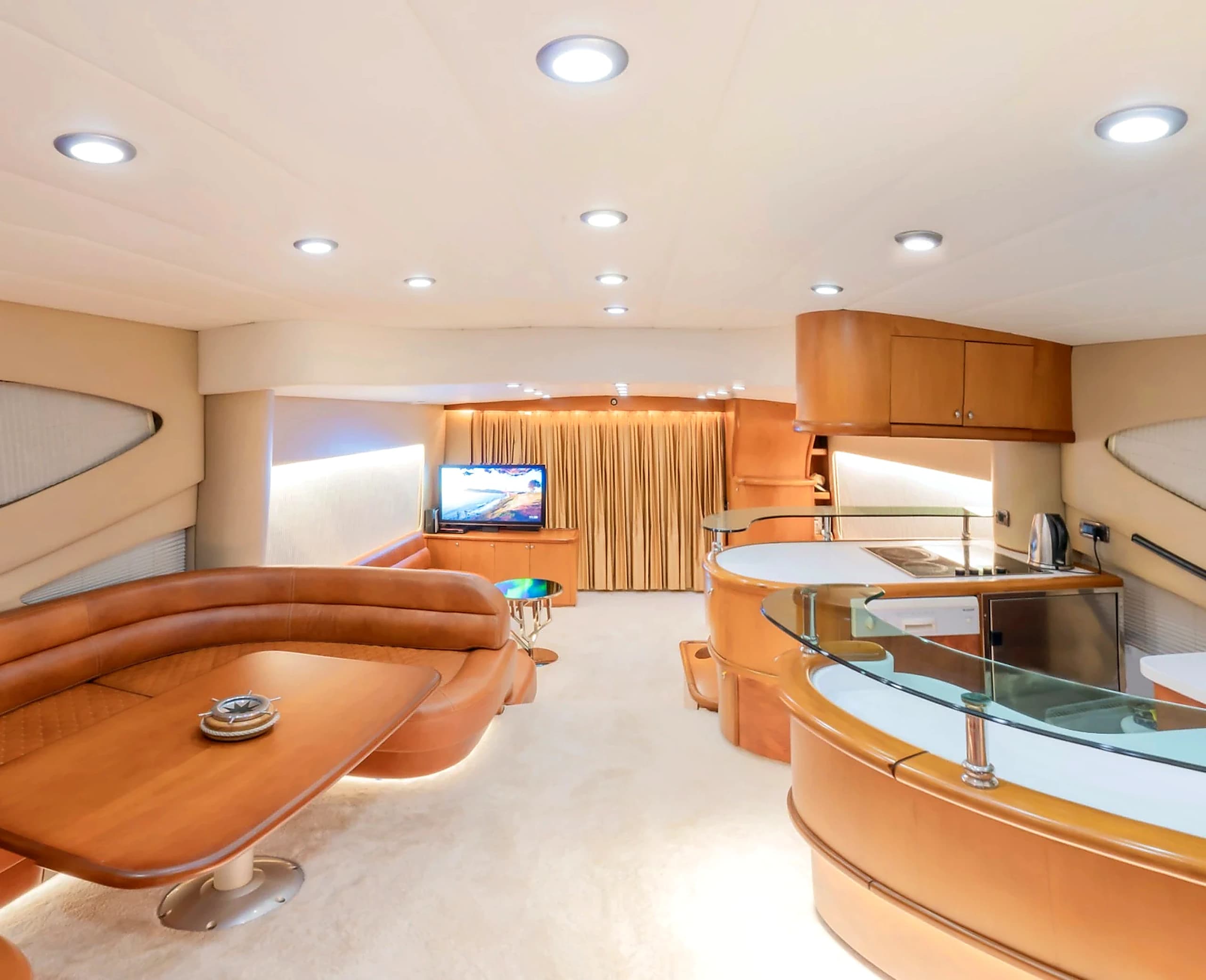 Main Salon Full Service Bar, Entertainment Screen and Fine Woodwork