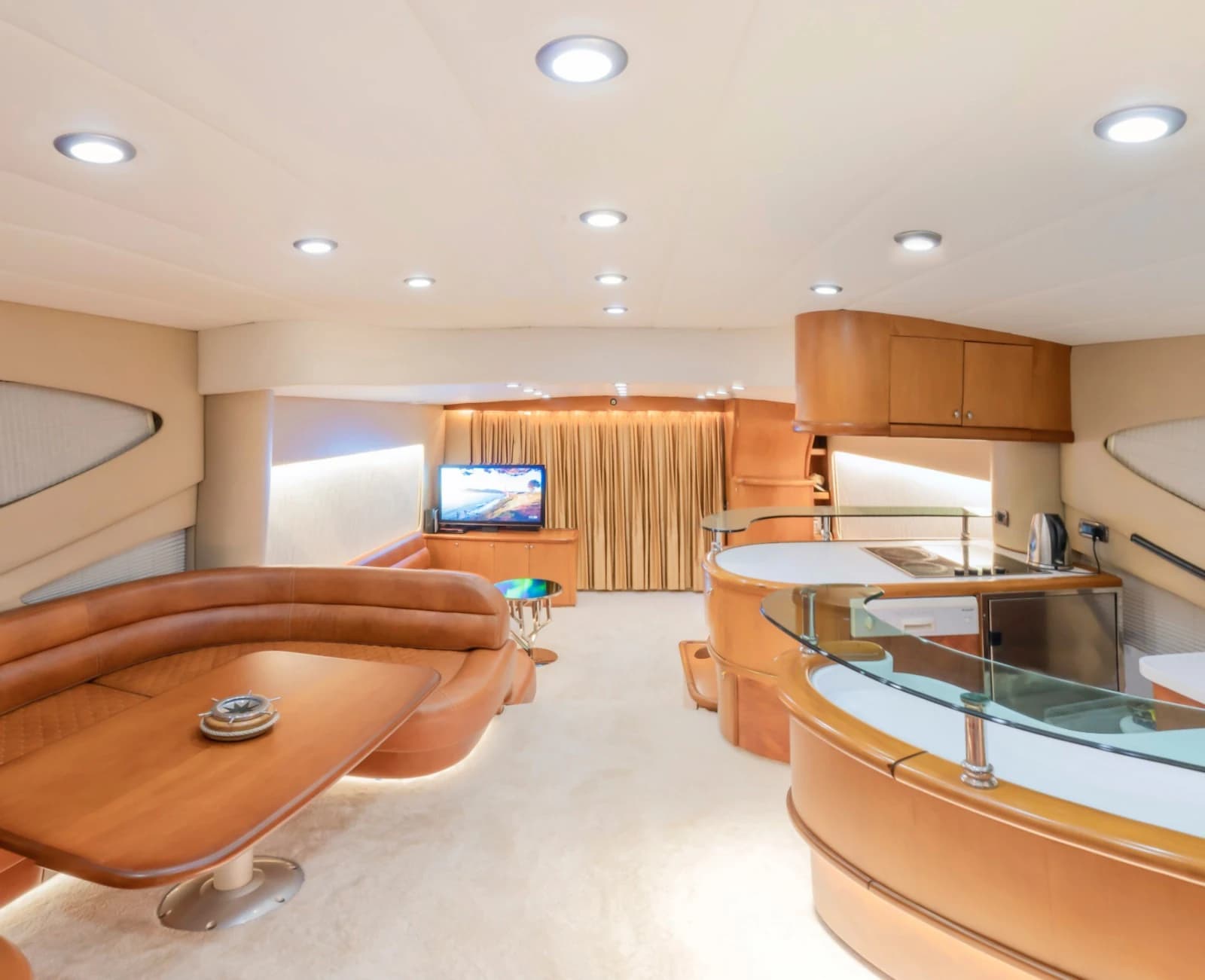 Main Salon Full Service Bar, Entertainment Screen and Fine Woodwork