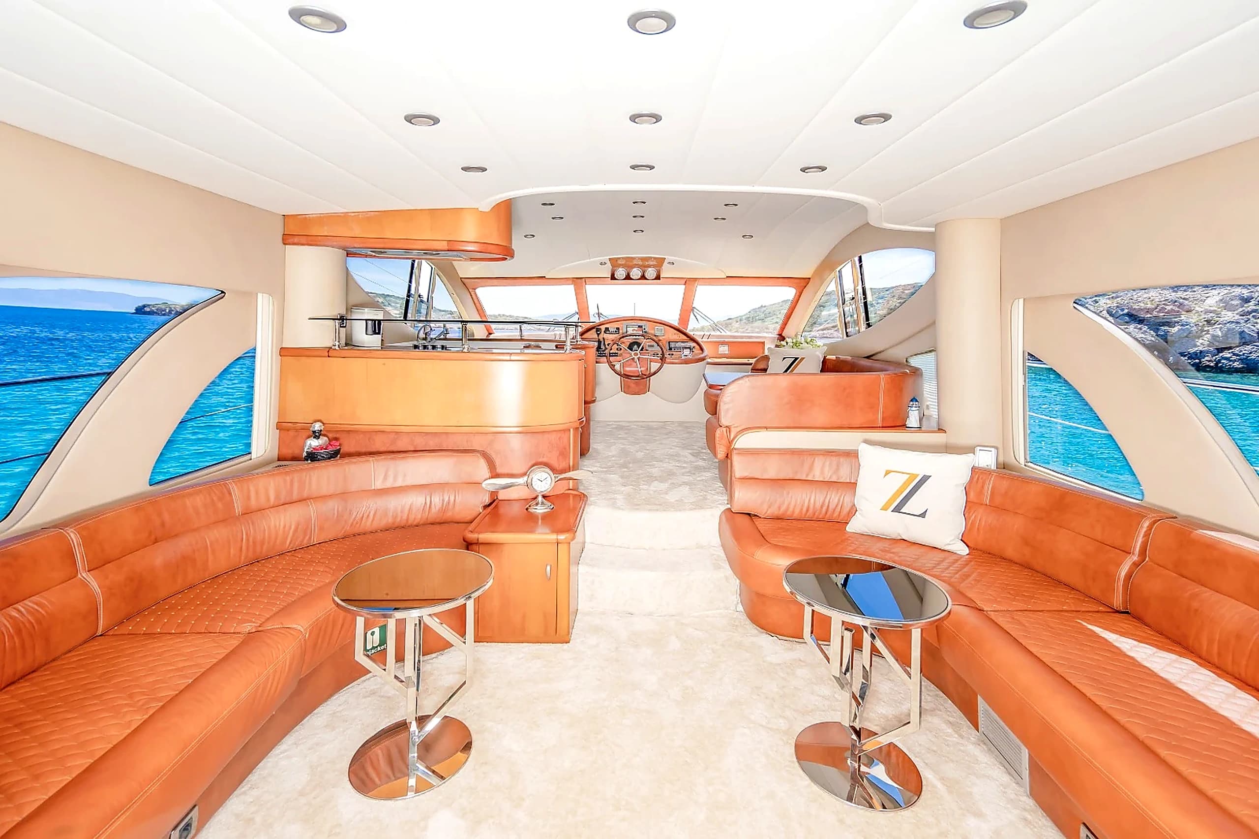 Panoramic Forward Windows and Leather Sofas in ZL Yacht Main Salon