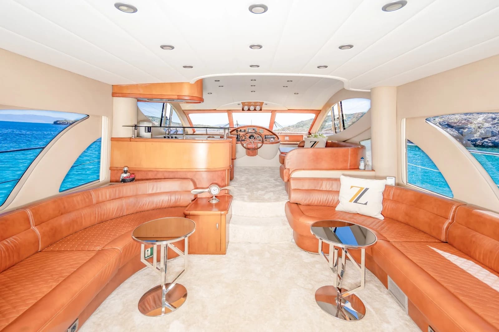 Panoramic Forward Windows and Leather Sofas in ZL Yacht Main Salon