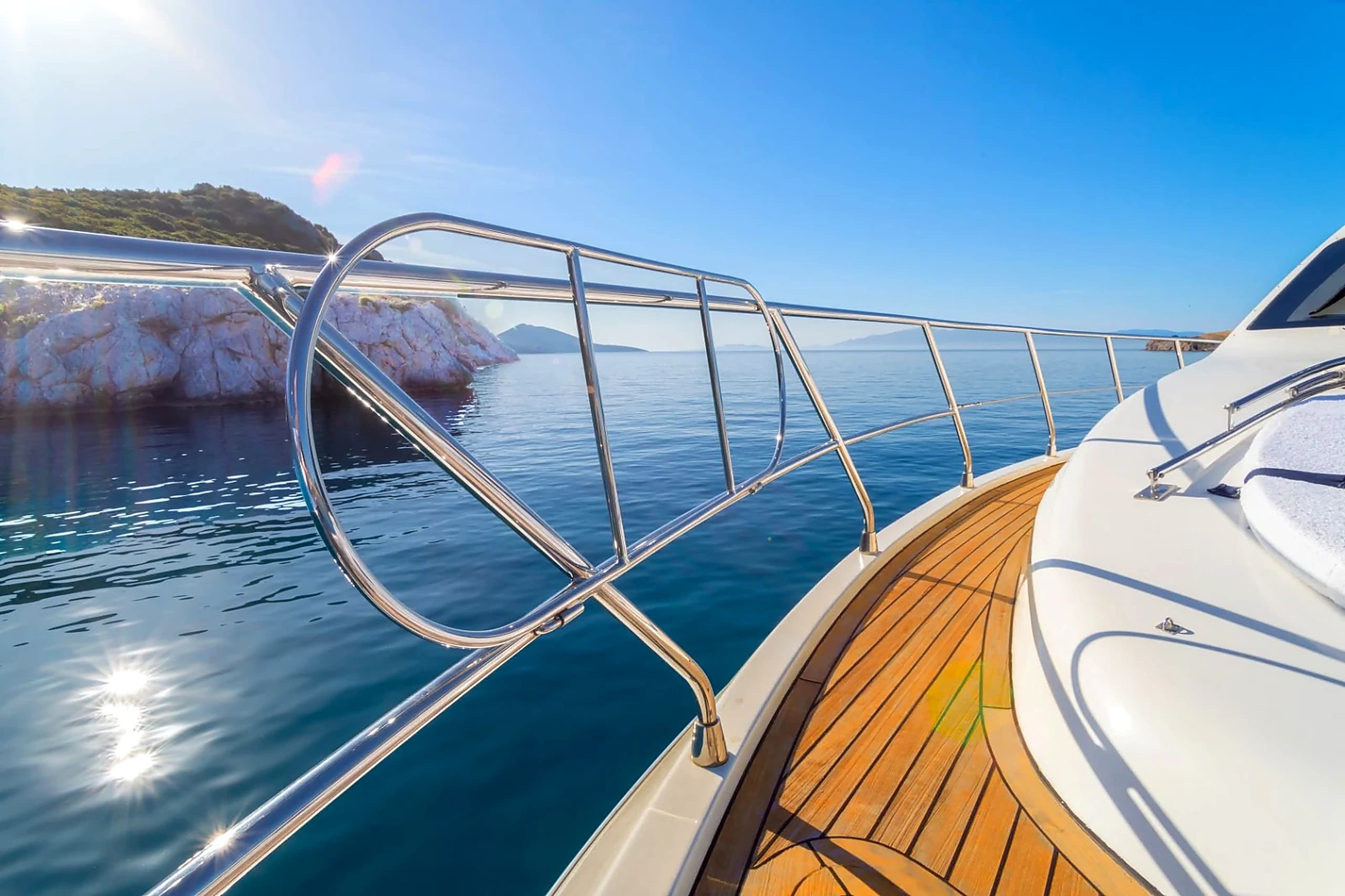 Polished Teak Side Deck Walkway Overlooking Turquoise Aegean Waters