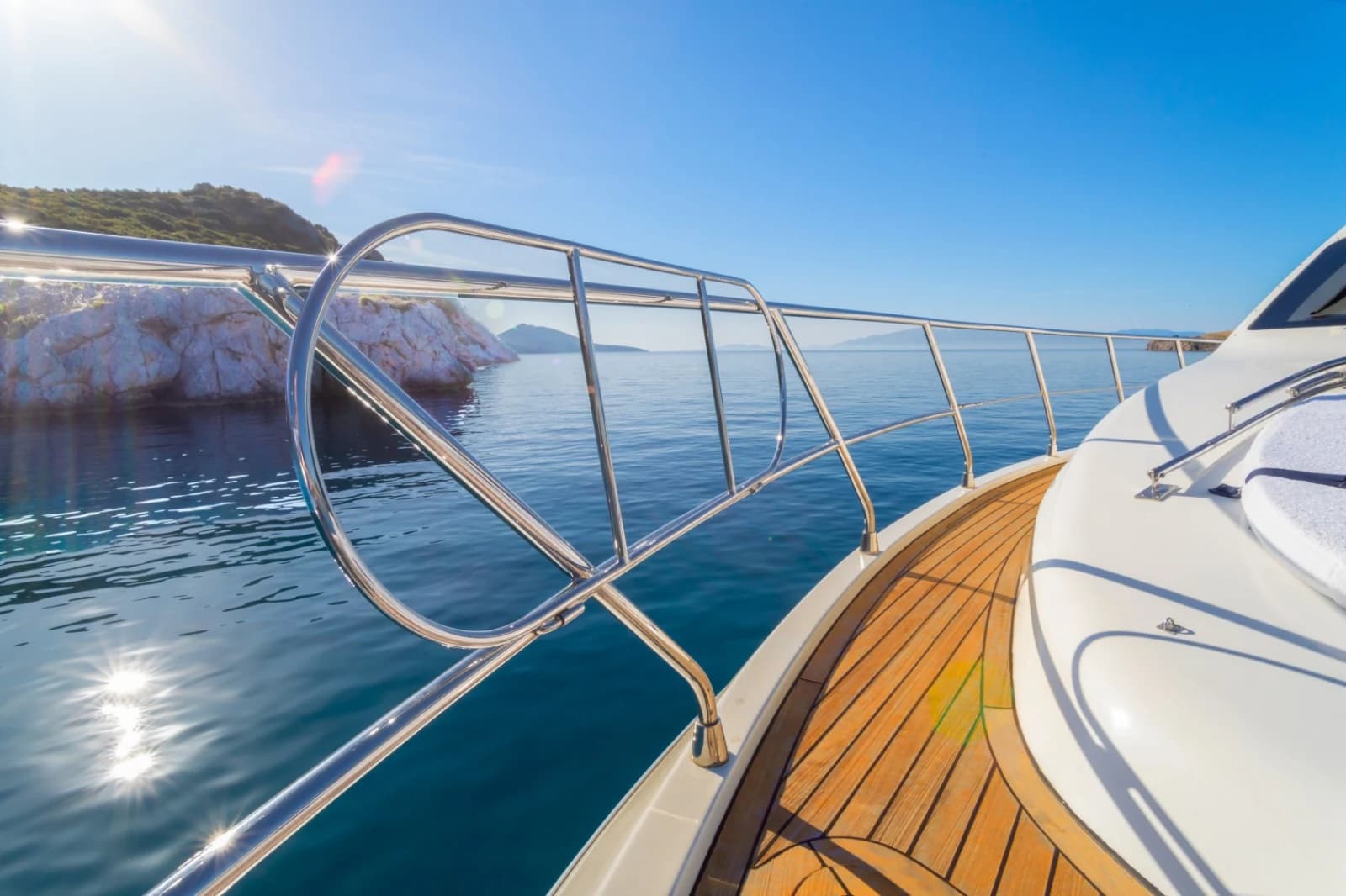 Polished Teak Side Deck Walkway Overlooking Turquoise Aegean Waters