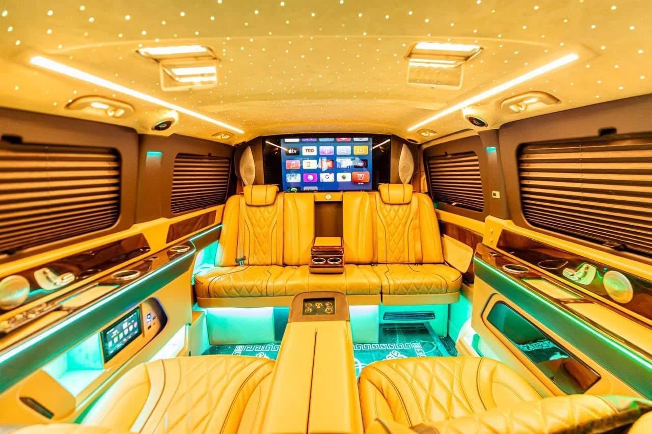 Tan leather VIP Vito cabin with rear lounge and starlight ceiling