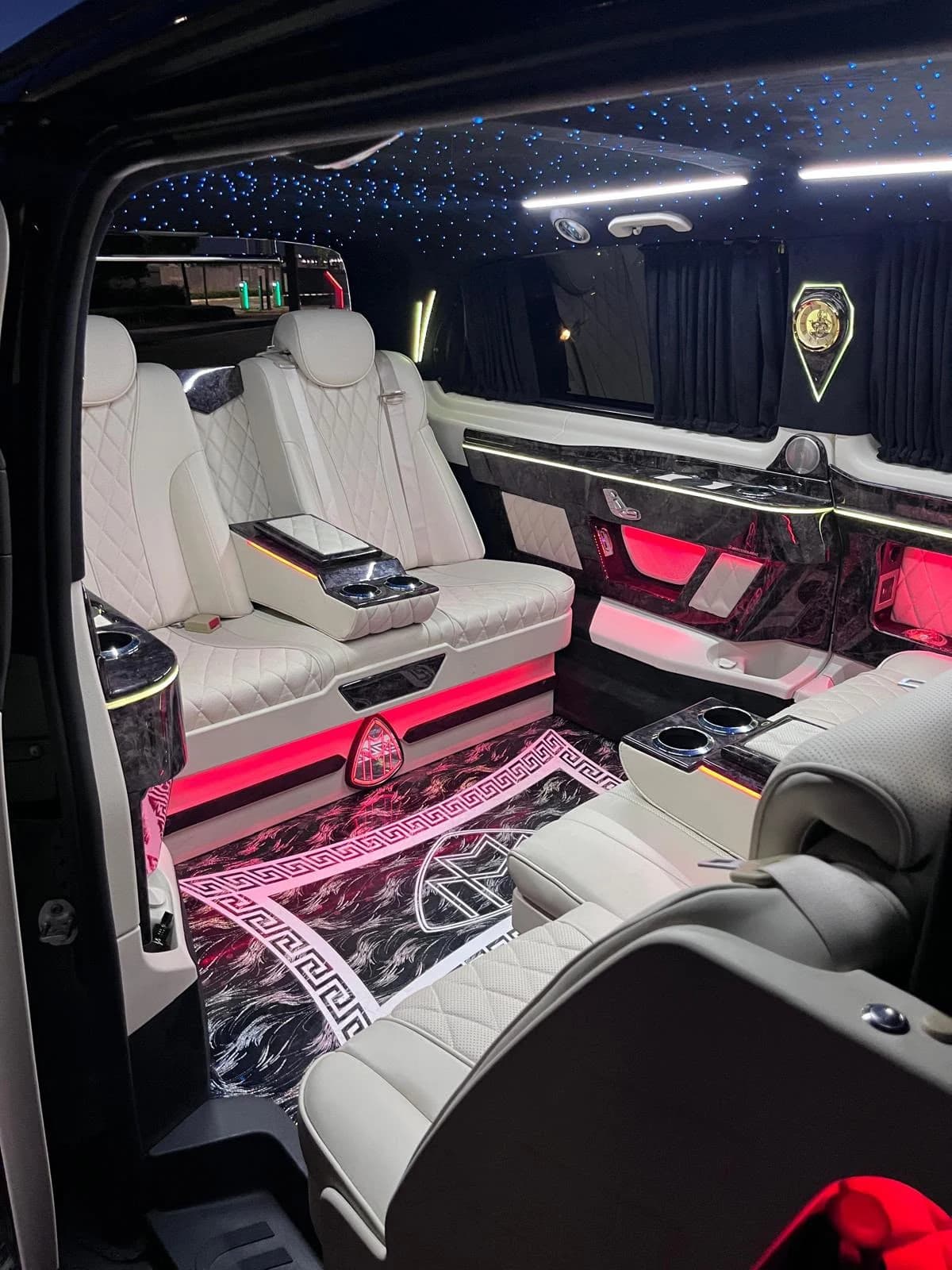 White leather VIP Vito cabin with individual seats and starlight ceiling